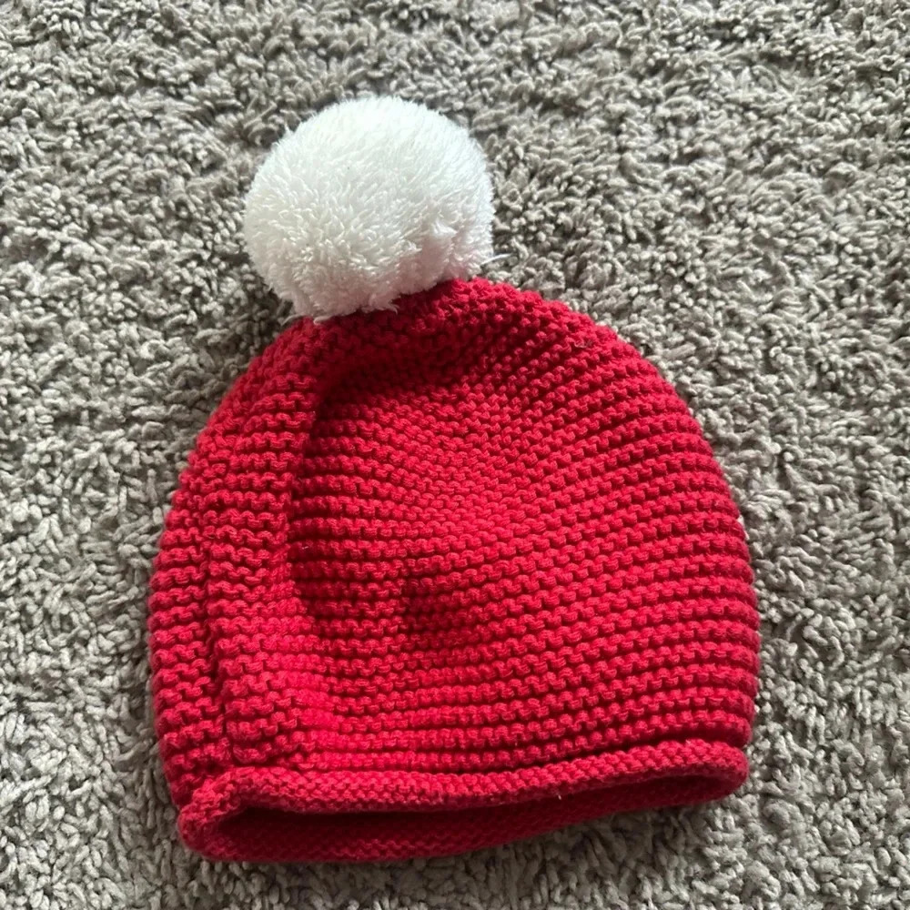 Red and white beanie.